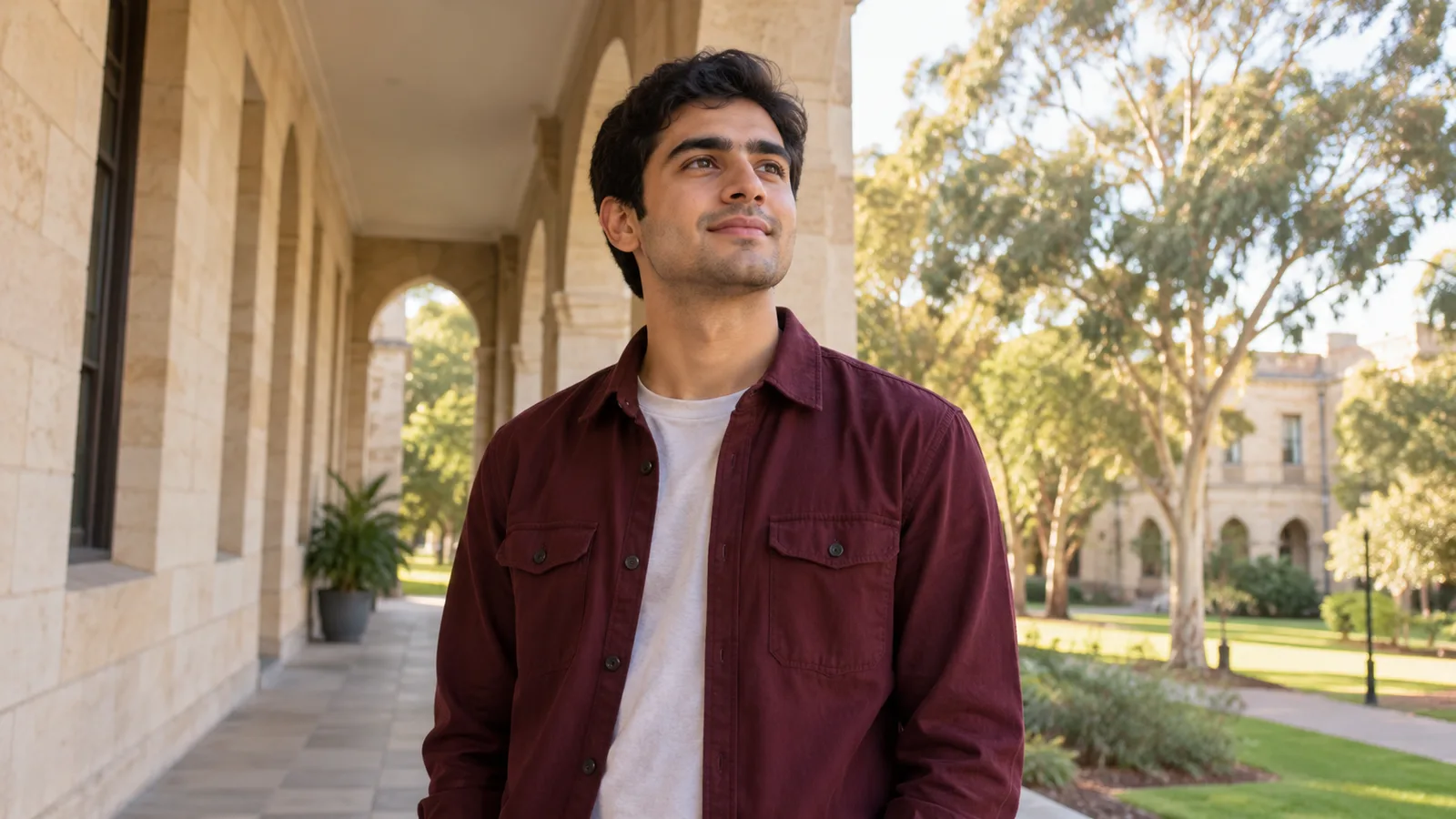 A Pakistani student considers his future on an Australian university veranda.